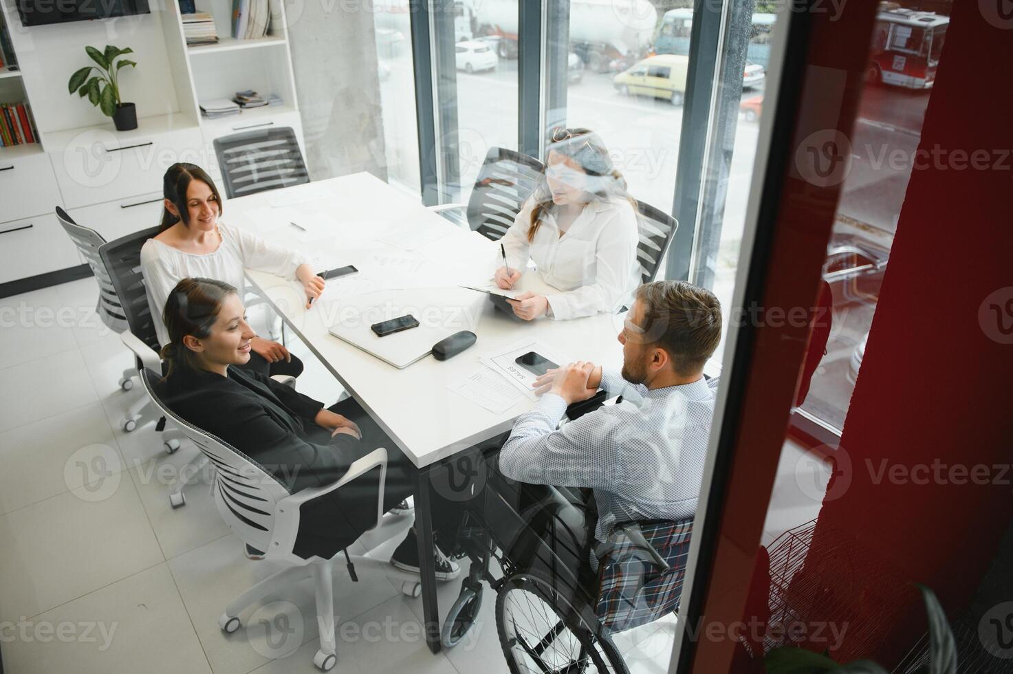 A group of business people partners during a set team meeting in the modern office. Teamwork concept photo