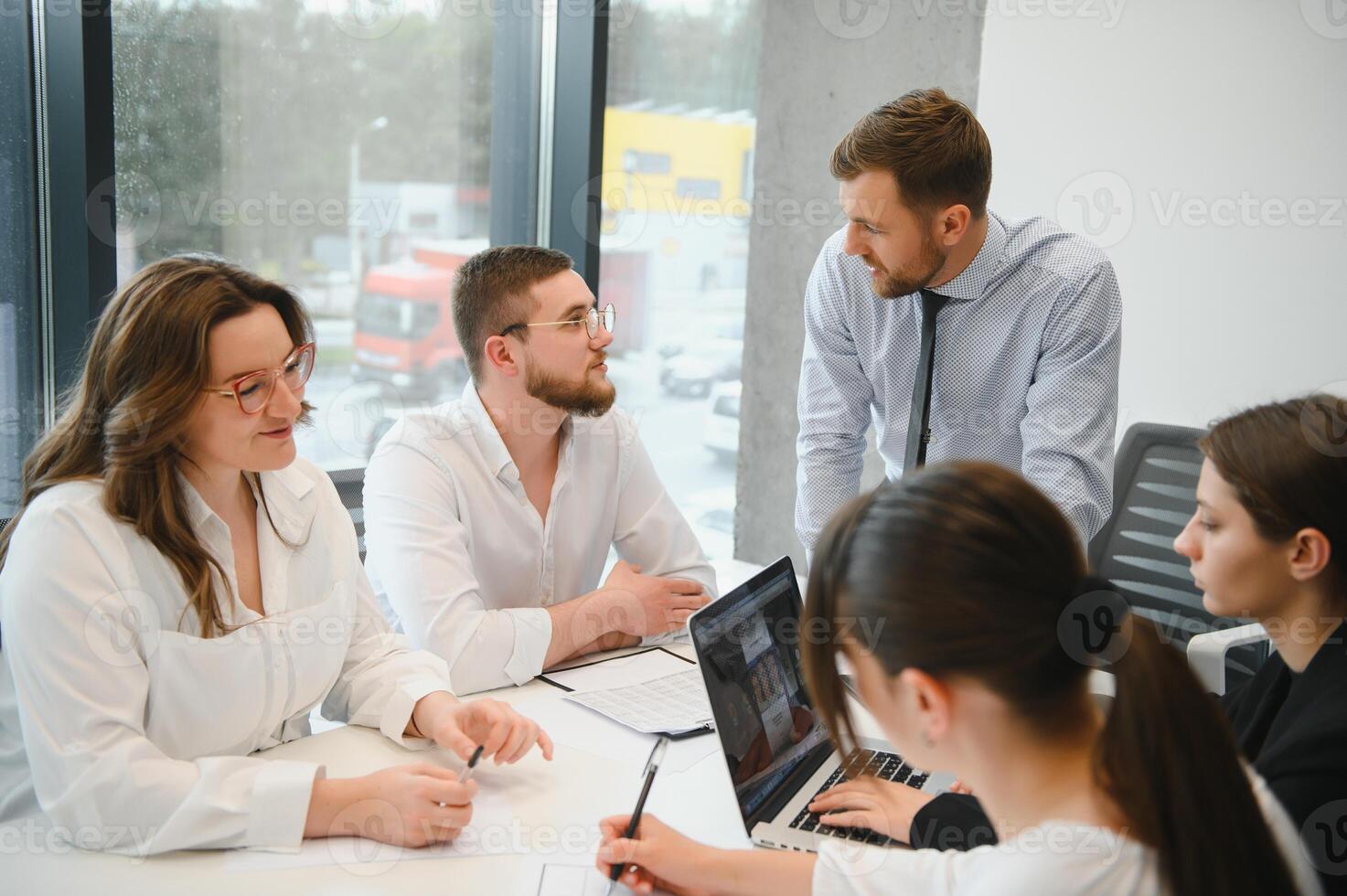 Business people working on project in office photo