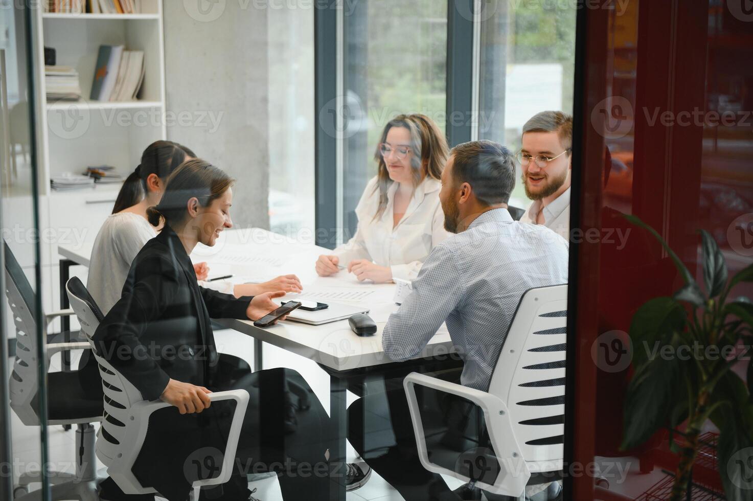 Corporate business team and in a meeting at modern office with big windows . High quality photo