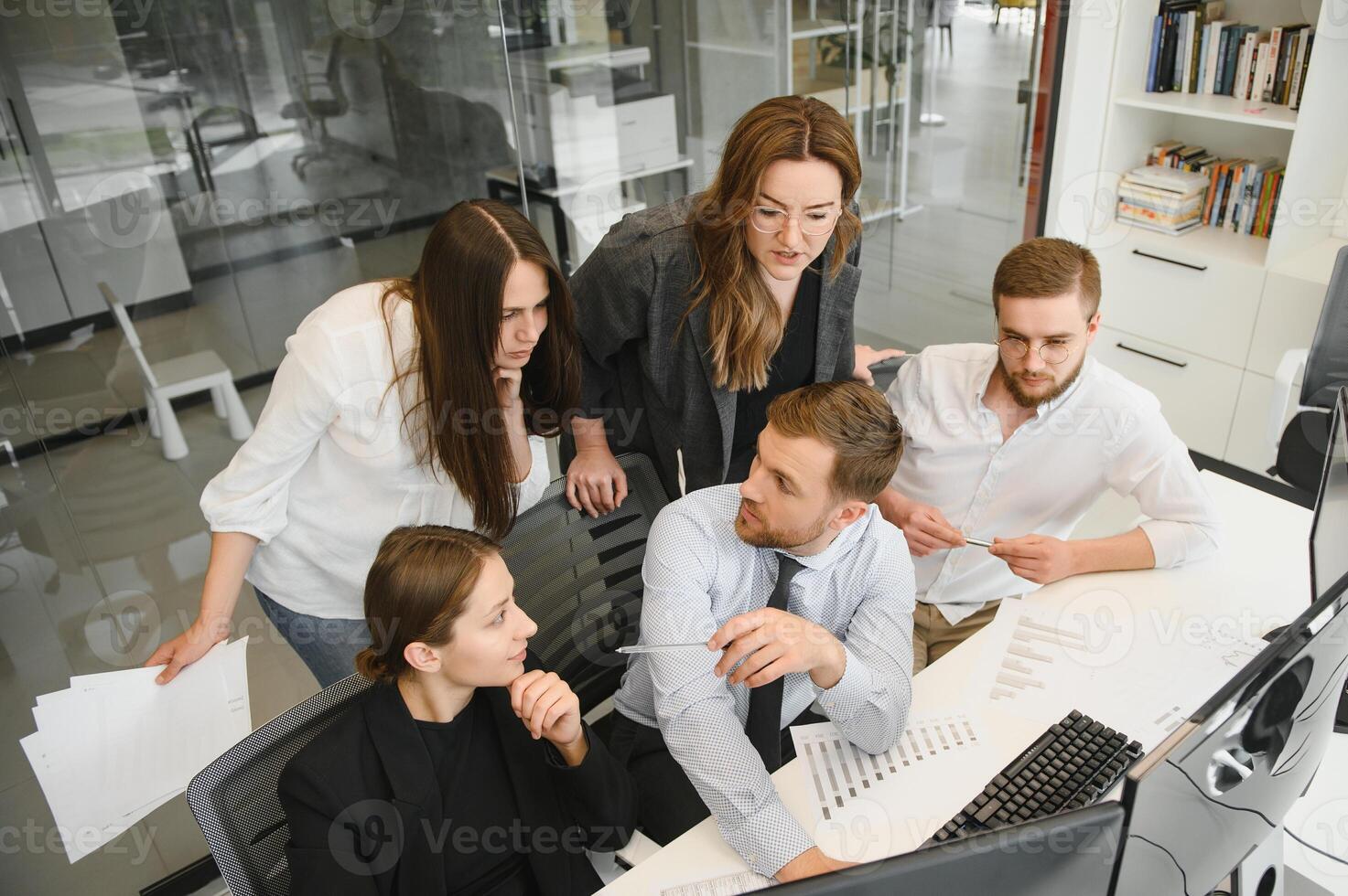 Business people working on project in office photo