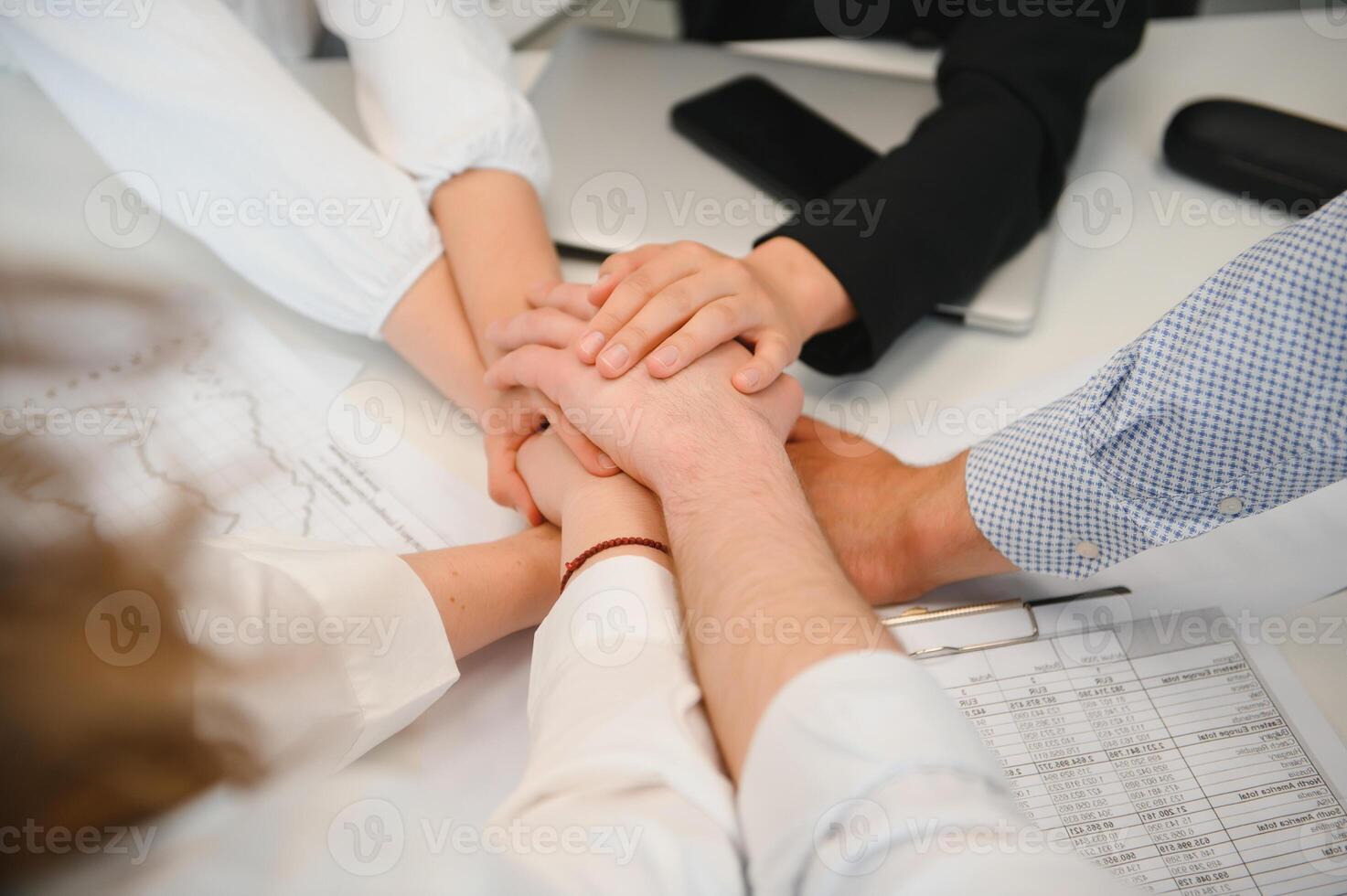 A group of business people partners during a set team meeting in the modern office. Teamwork concept photo