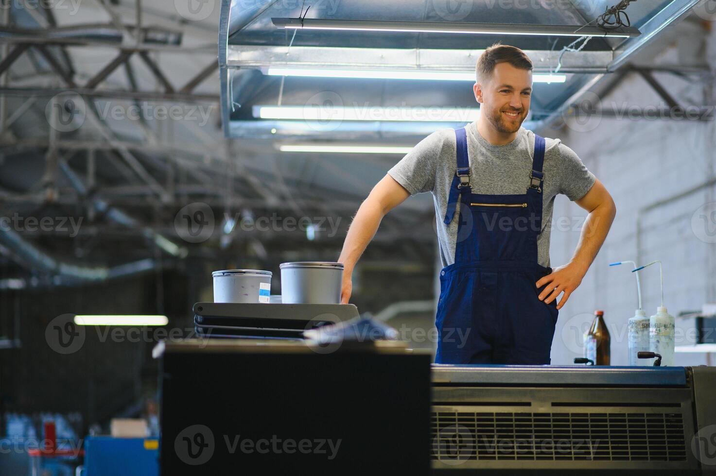 Factory worker. Man working on the production line. photo