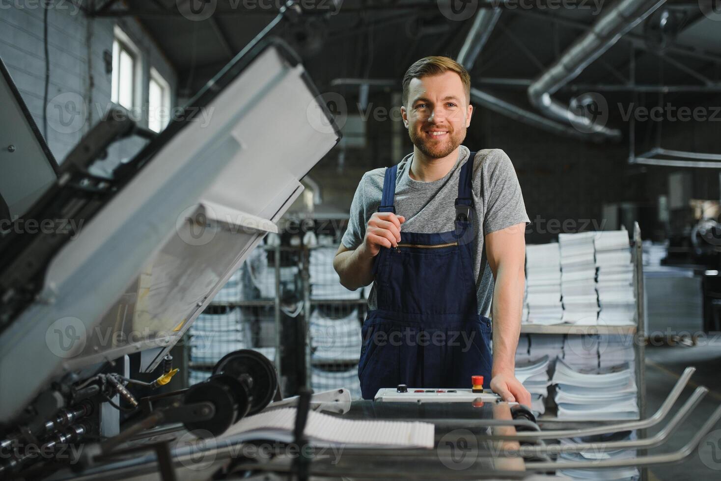 Factory worker. Man working on the production line. photo