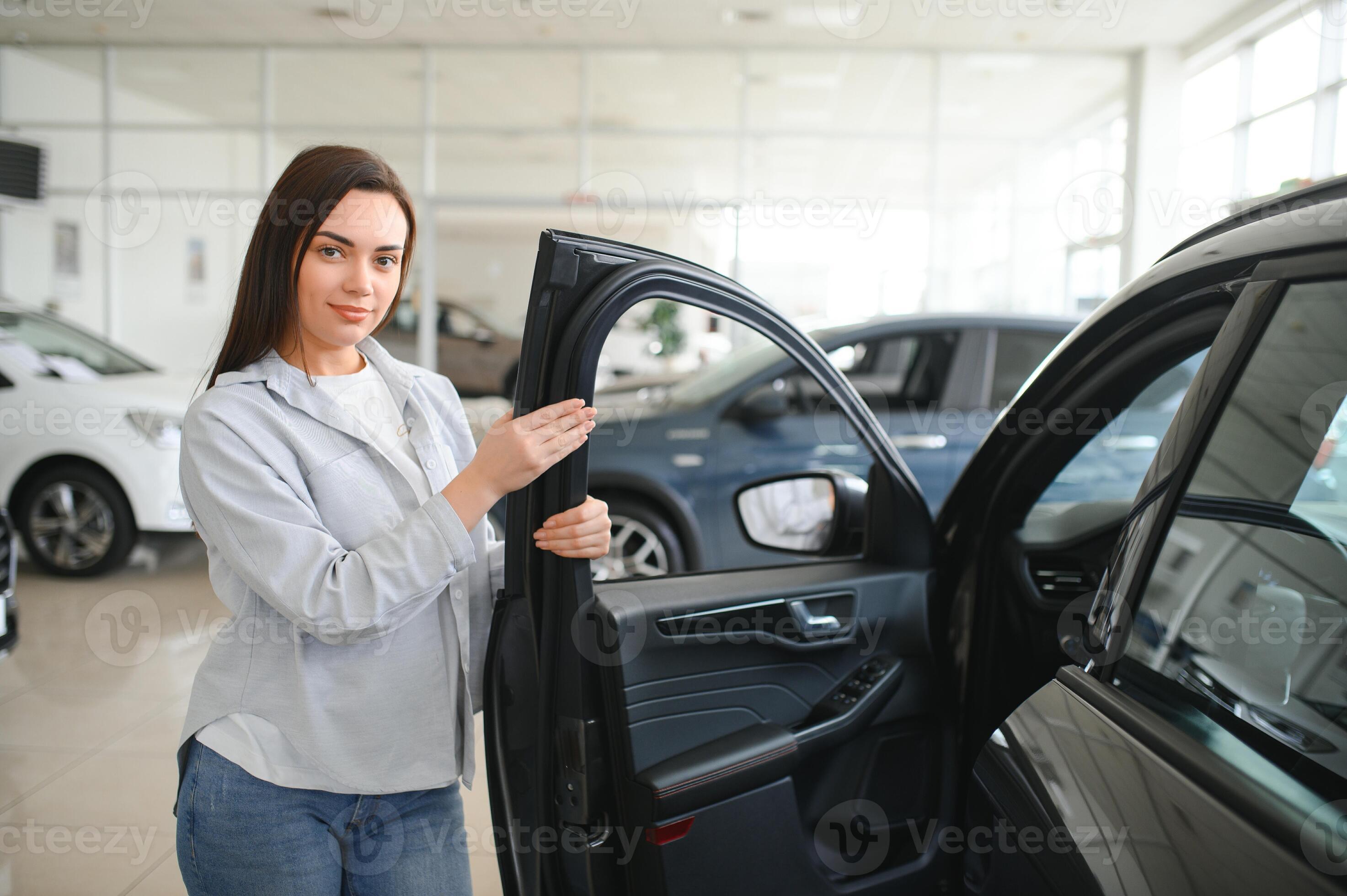 Happy friendly woman customer female buyer client chooses auto wants to - Cathy Wants To Buy A New Watch Online