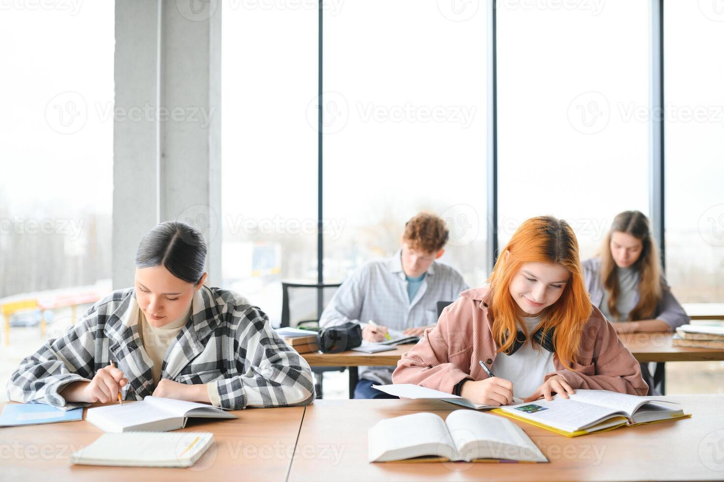 Students studying in library or classroom photo