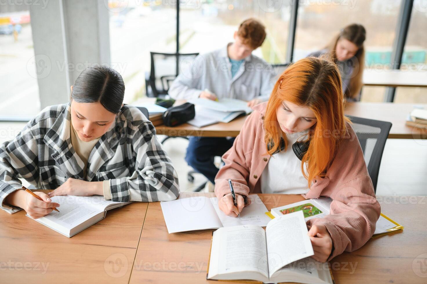Students studying in library or classroom photo