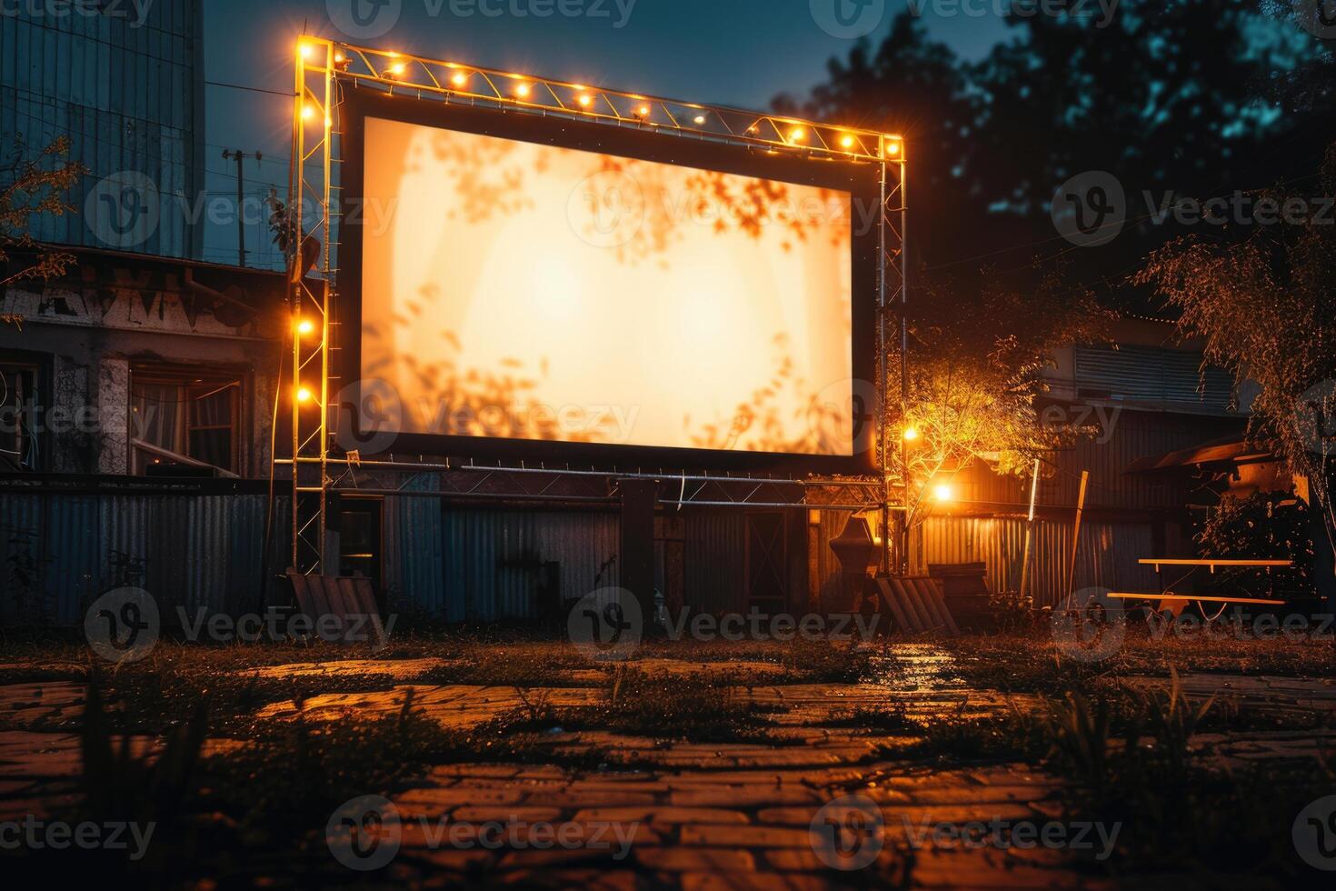 blank white screen outdoors in green grass park. outdoor cinema, big screen show. photo