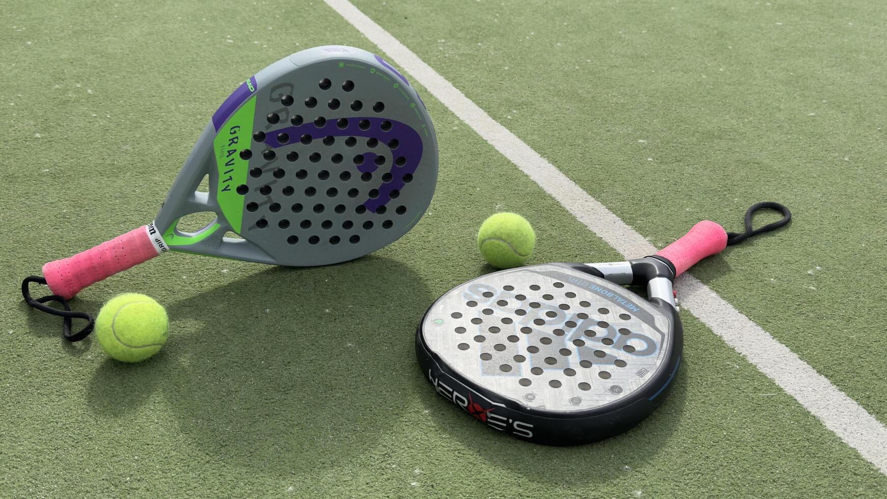Kyiv, Ukraine, May 15, 2024 paddle tennis racket and balls, padel game kit photo