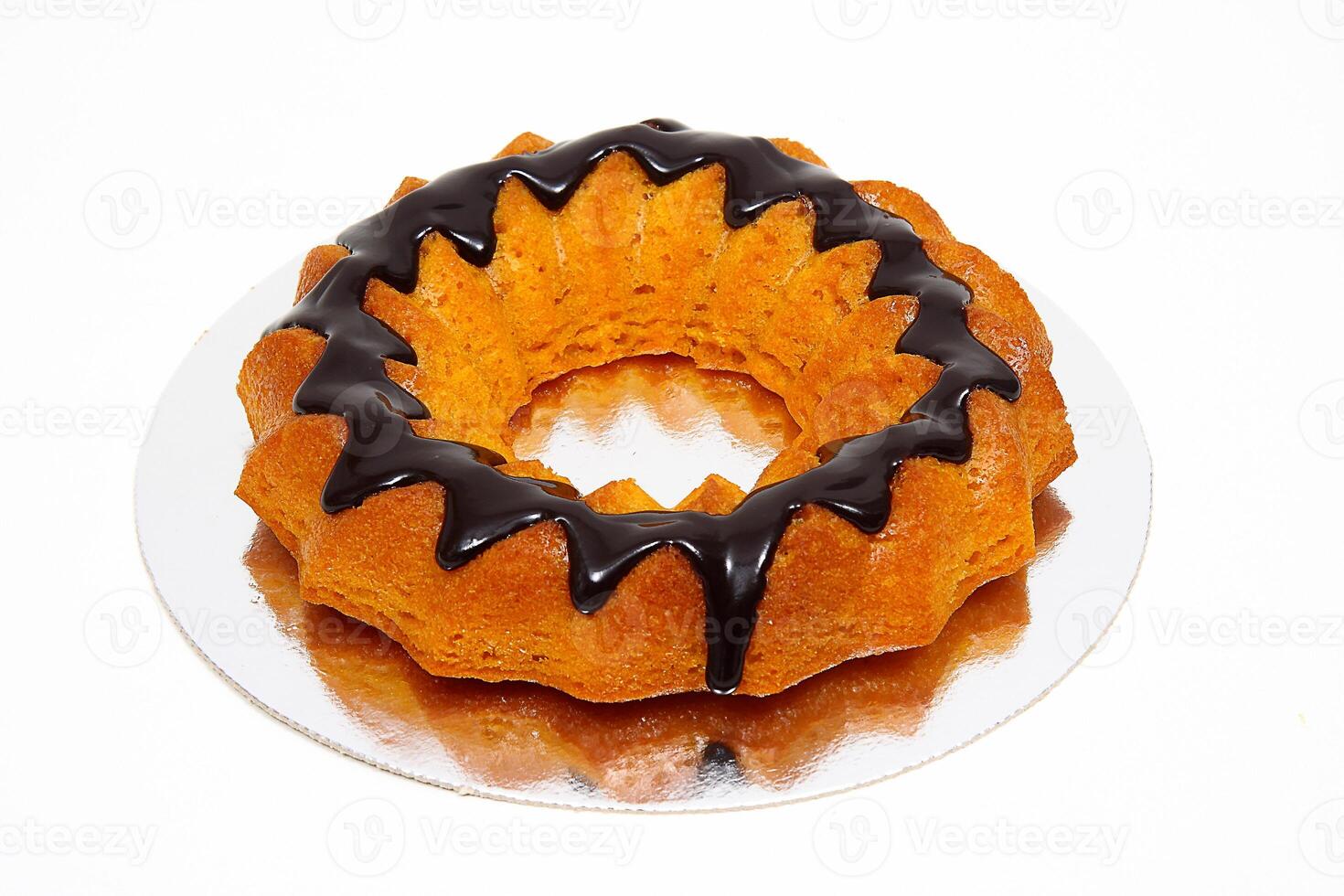Carrot cake with chocolate icing photo