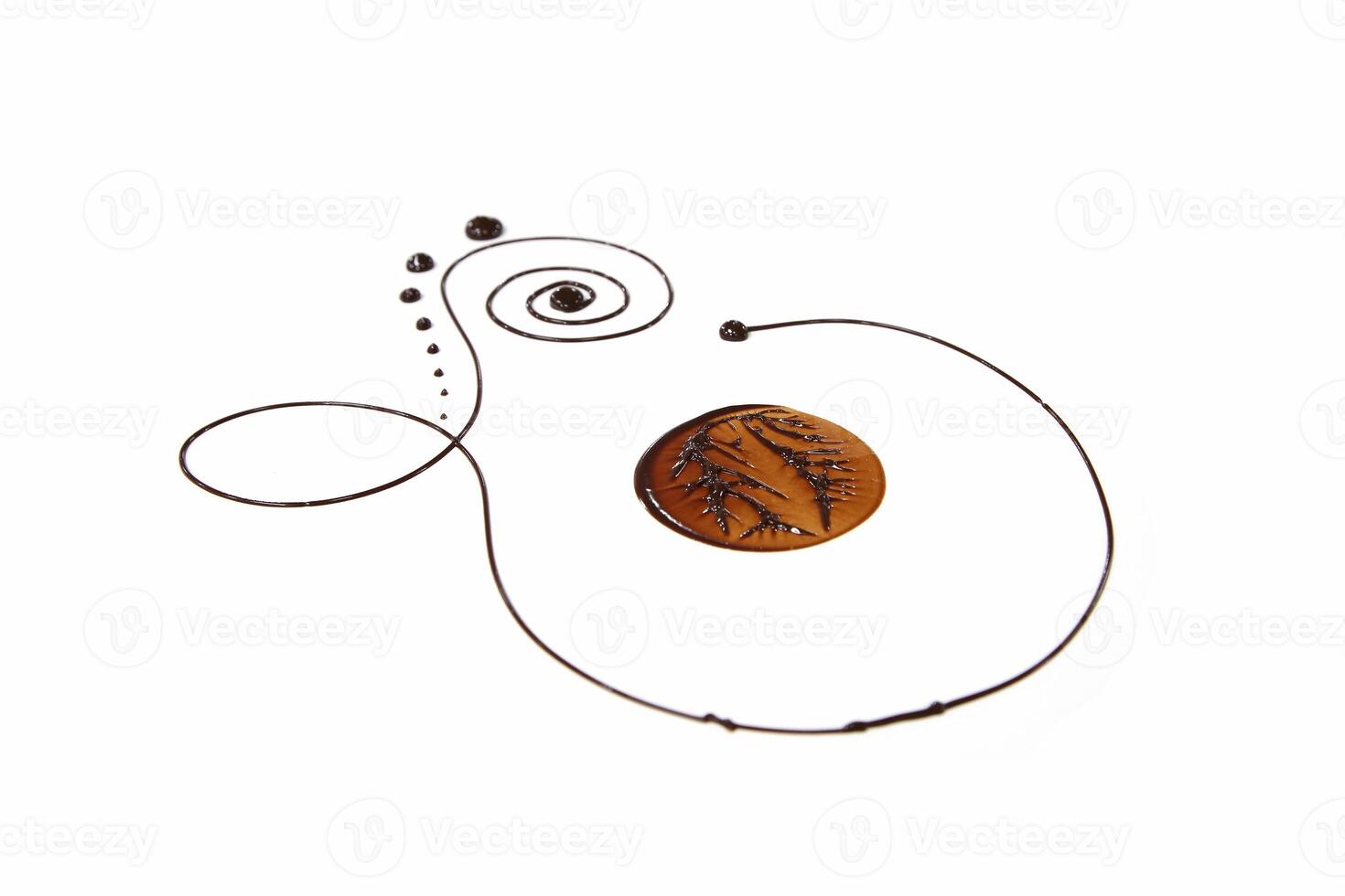 decorative designs made with chocolate on a white background photo