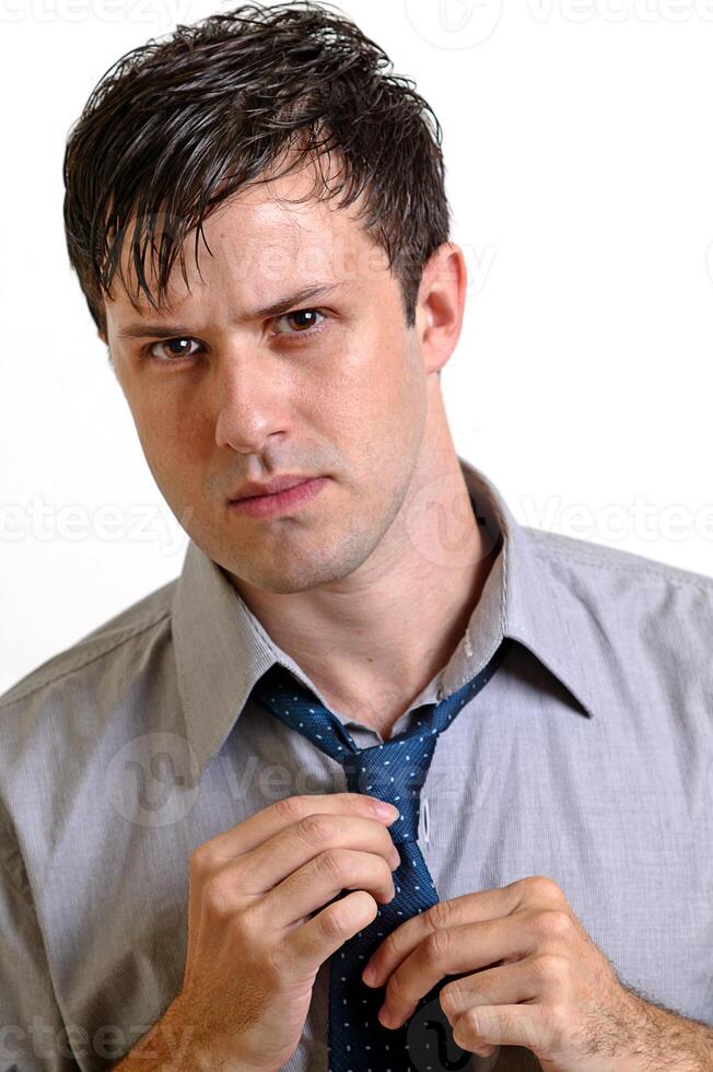young man with beard in different situations on neutral background photo