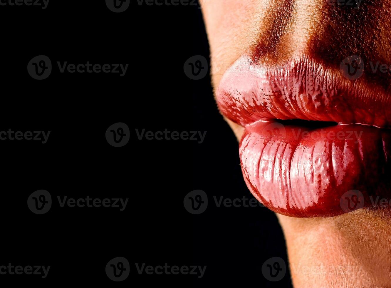 beautiful woman lips close up on black background photo