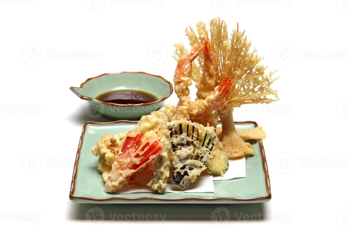 Shrimp and vegetable tempura, typical Japanese dish with breaded and fried shrimp and vegetables photo