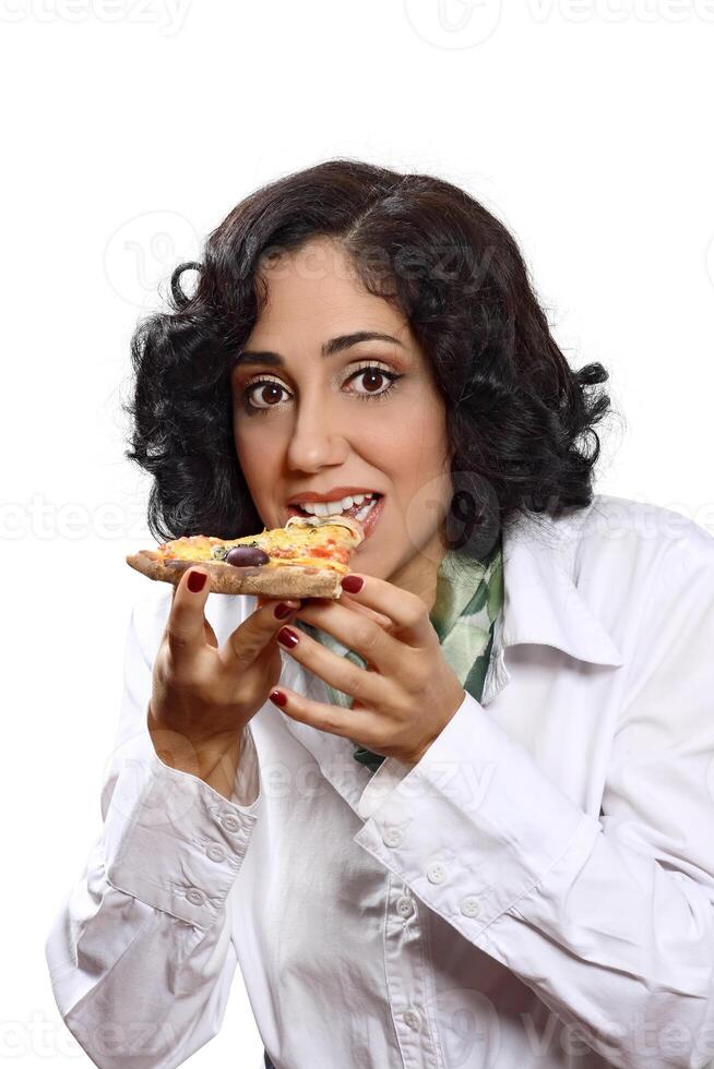 smiling brunette model with her piece of pizza photo