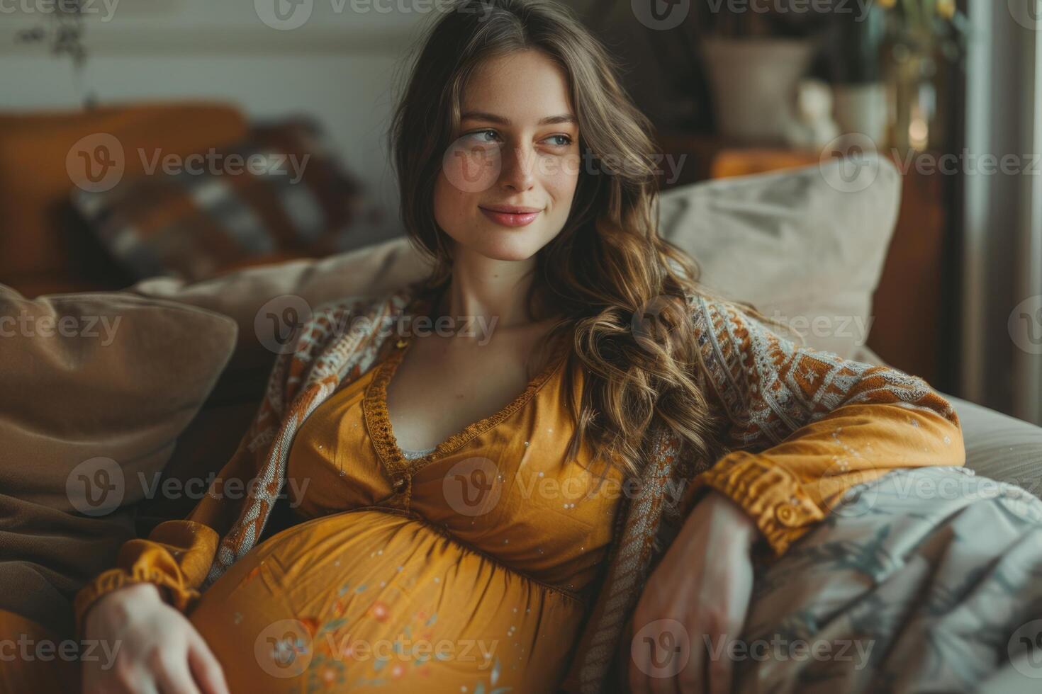 Young Pregnant woman holding belly. photo