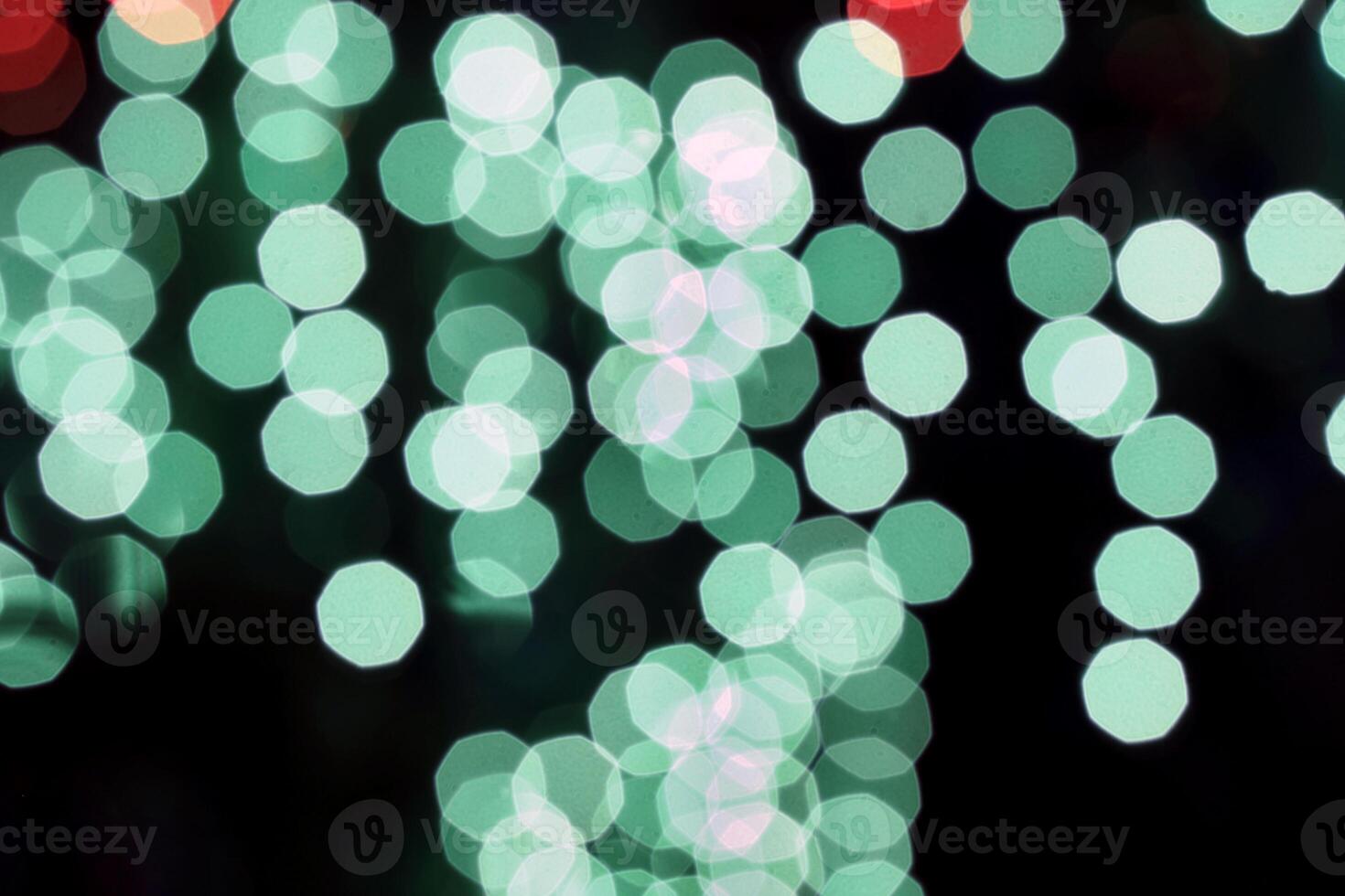 colorful and defocused lights on black background photo