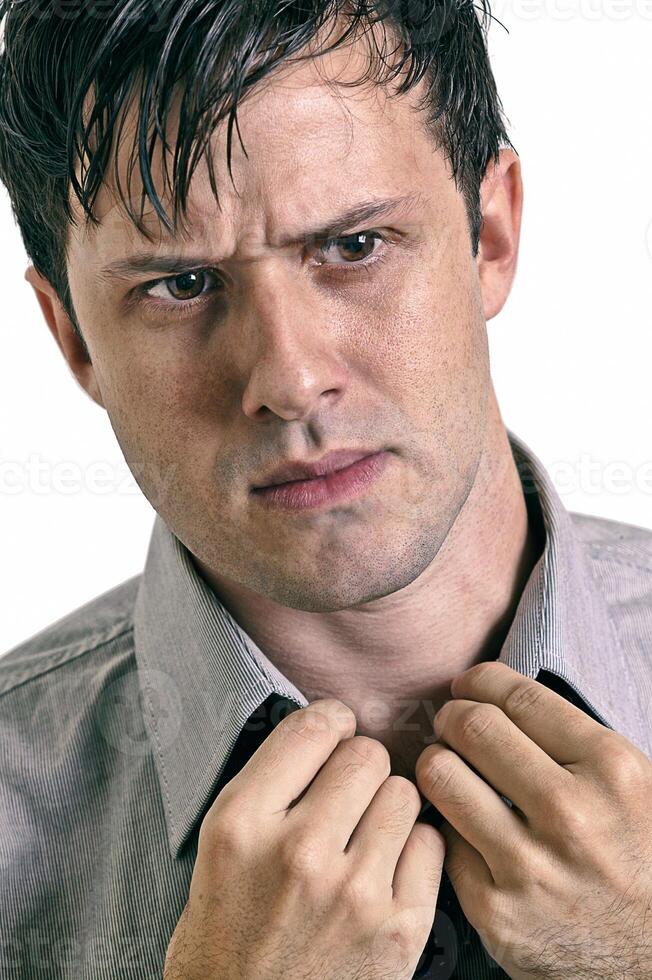 young man with beard in different situations on neutral background photo