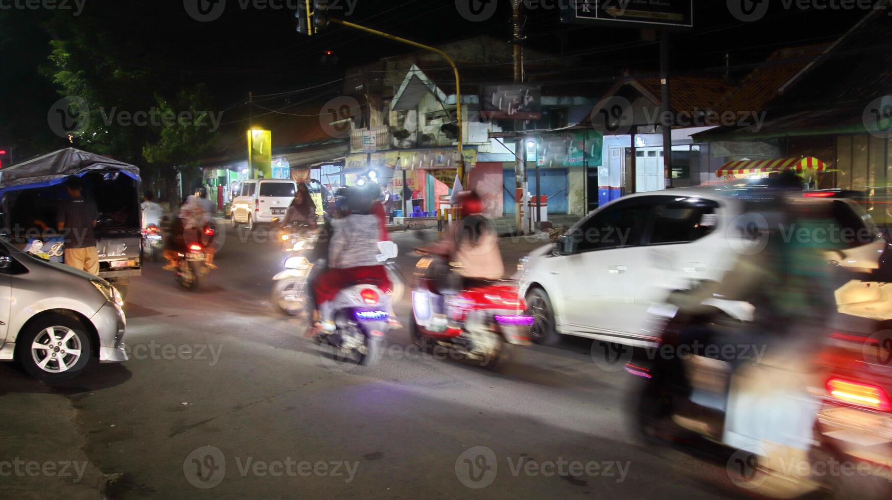 Blurry image of a car at speed photo