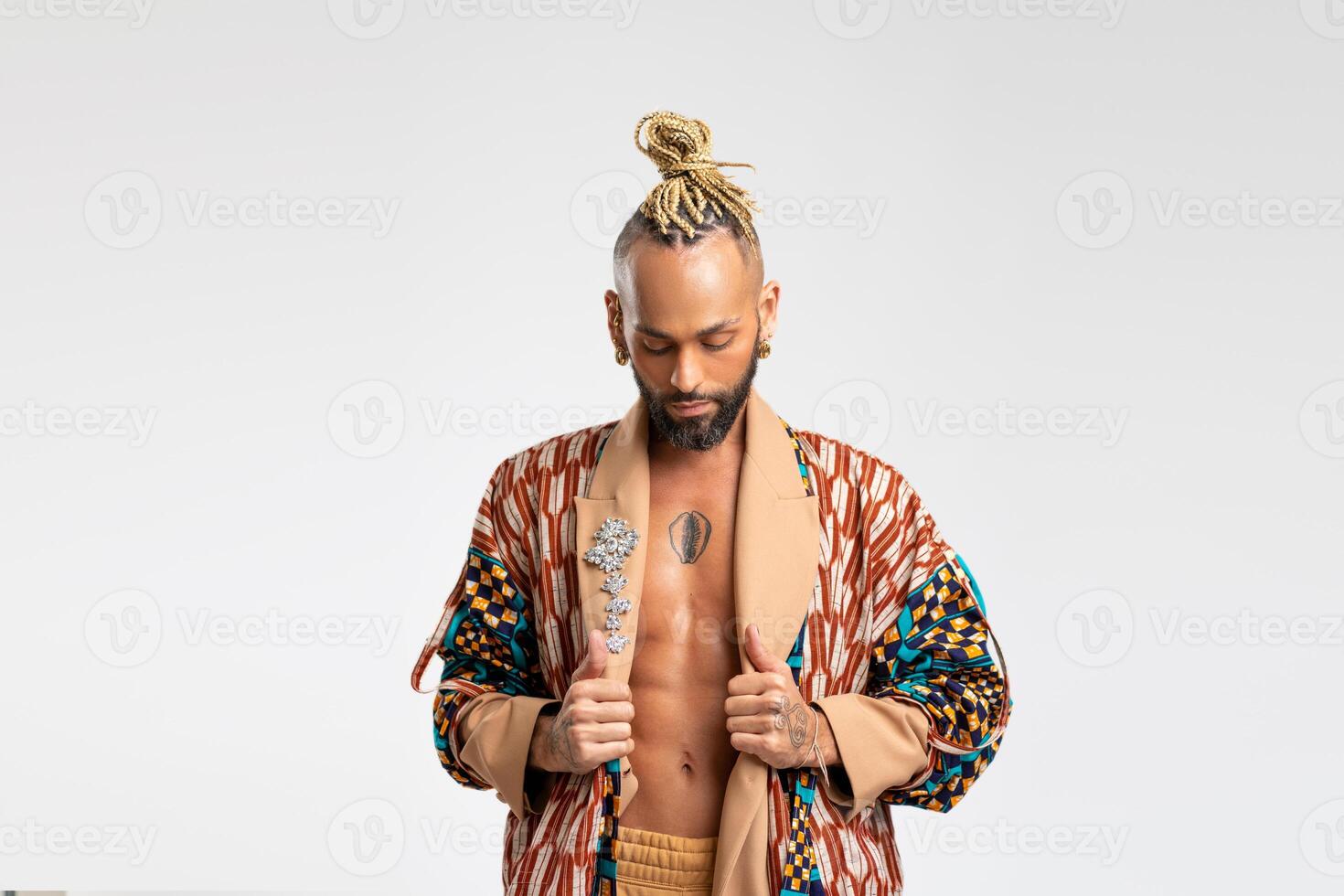 African-american guy wearing vibrant stylish jacket isolated on white background photo