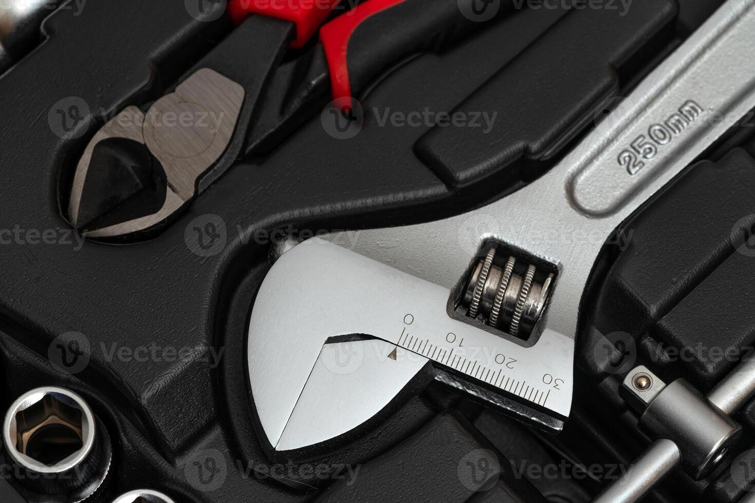 Adjustable wrench in the toolbox. photo