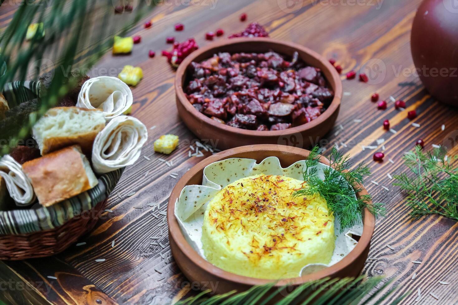 Table With Assorted Bowls Filled With Food photo