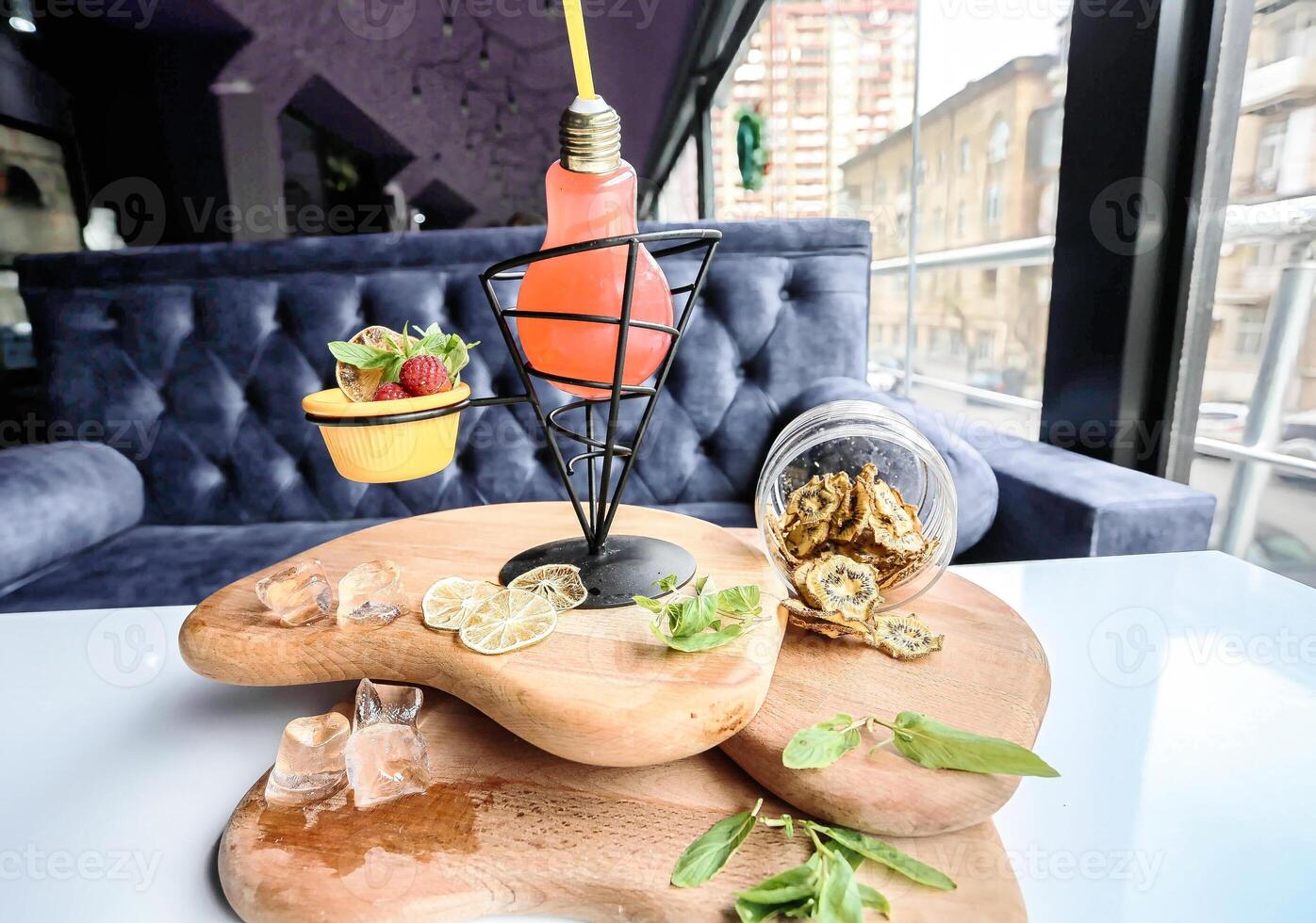 Table With Cutting Board Covered in Food photo