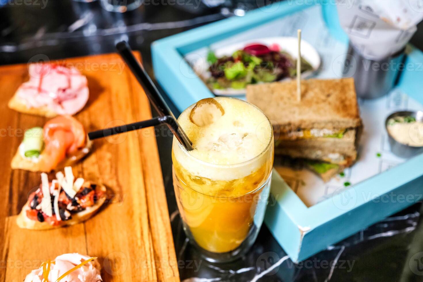 Tray of Food and Drink on Table photo
