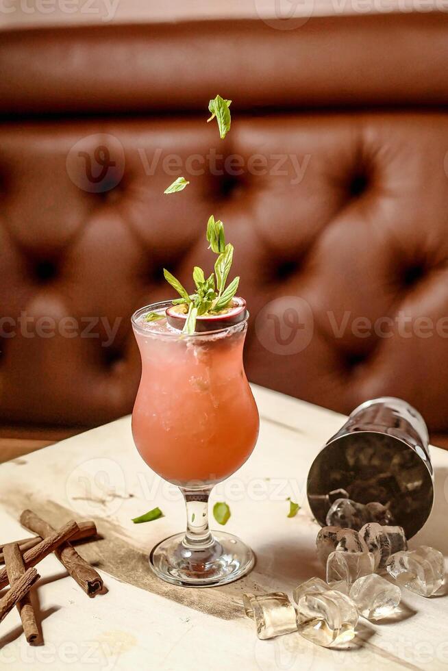 Refreshing Drink in Glass on Table photo