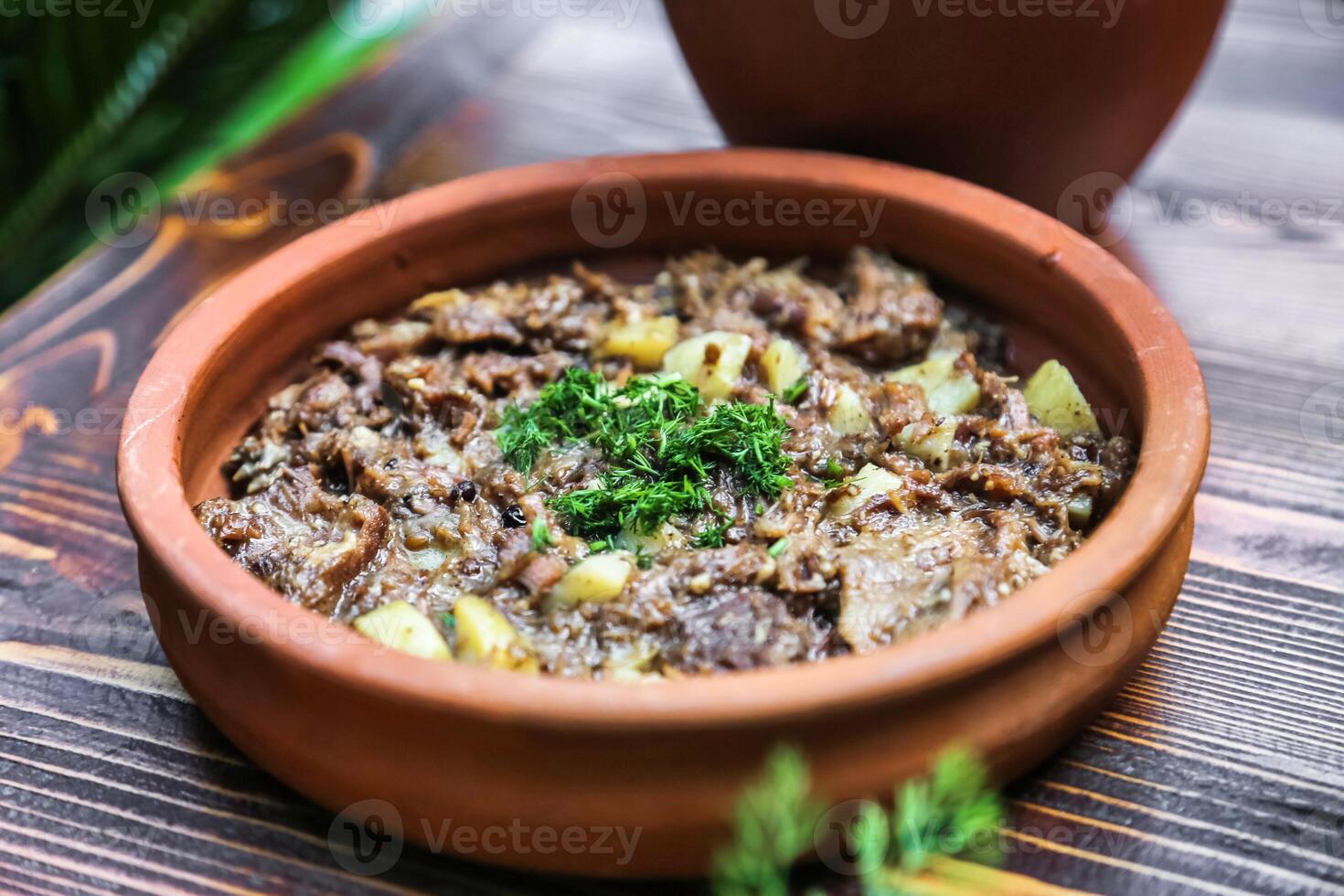 Bowl of Food on Wooden Table photo