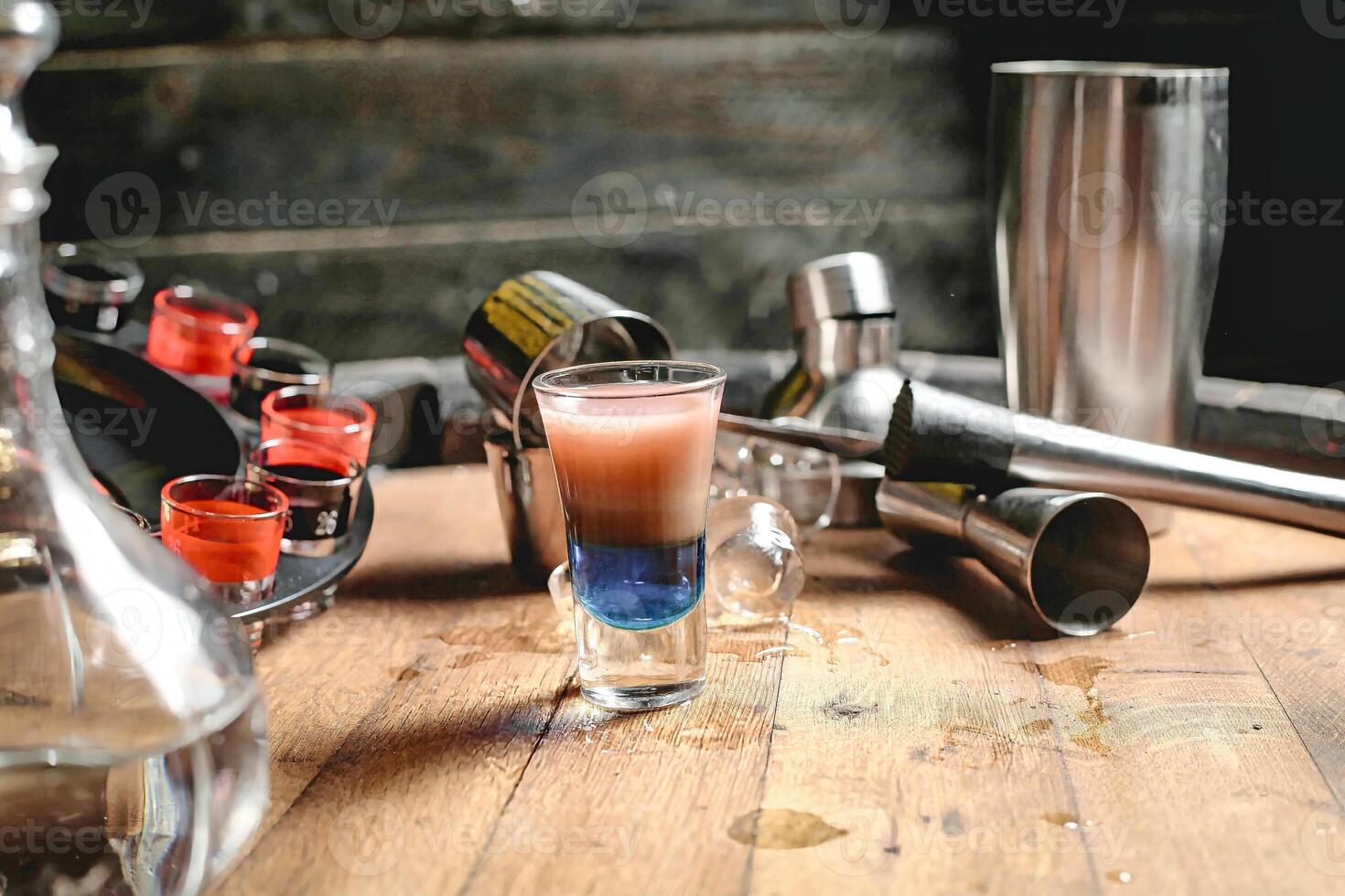 Wooden Table With Liquid-Filled Shot Glass photo
