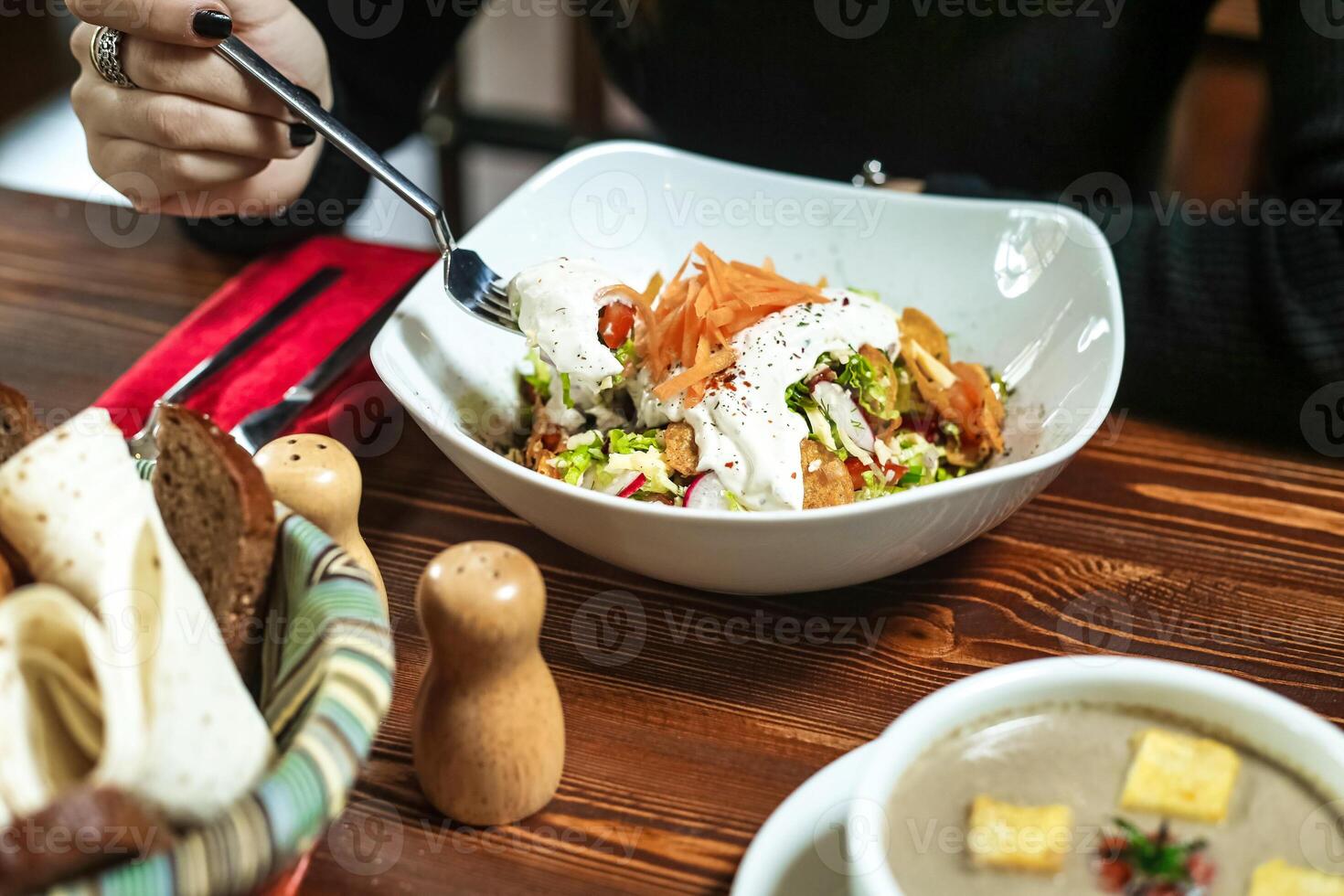 Deliciously Prepared Bowl of Food on Rustic Wooden Table photo