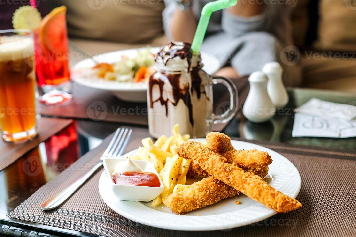 Delicious Meal With Refreshing Beverage on Table photo