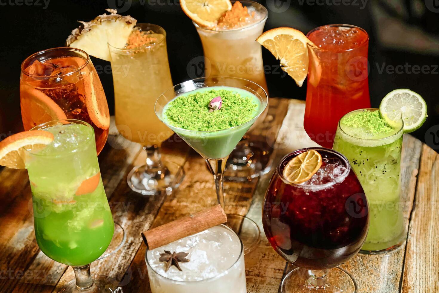 Assorted Drinks Arranged on a Wooden Table photo