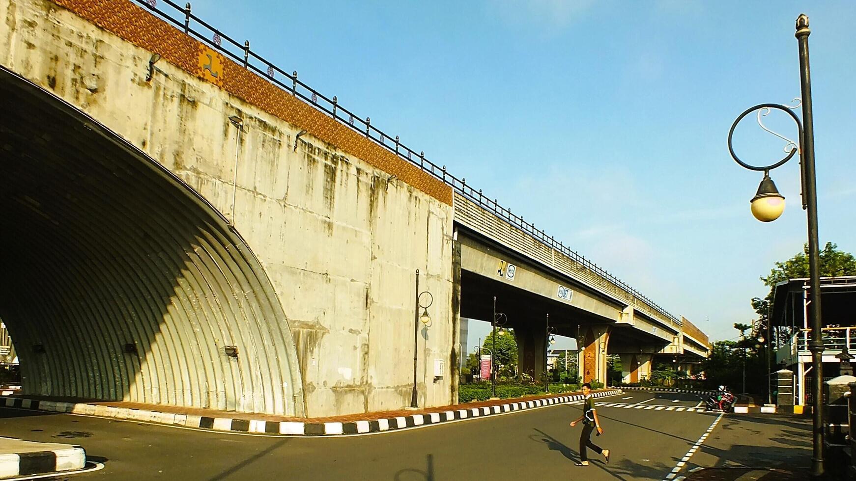 Surakarta, Central Java, Indonesia April 11, 2024. A sight seeing of Main Roads Slamet Riyadi Street in the morning. Not busy yet. People still preparing for their activity photo