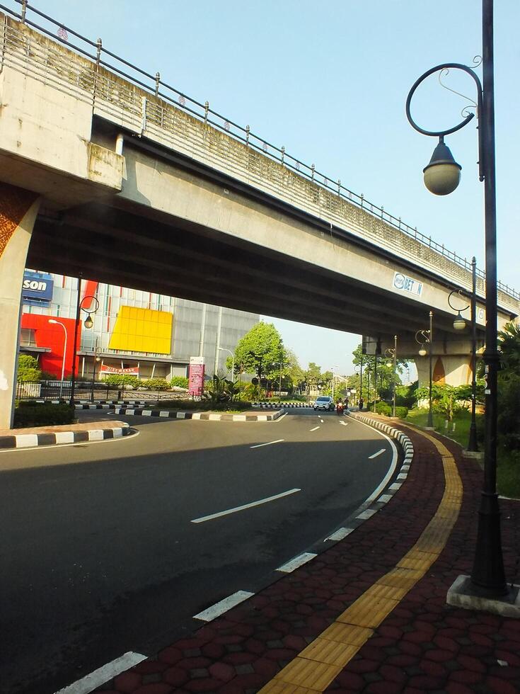 Surakarta, Central Java, Indonesia April 11, 2024. A sight seeing of Main Roads Slamet Riyadi Street in the morning. Not busy yet. People still preparing for their activity photo