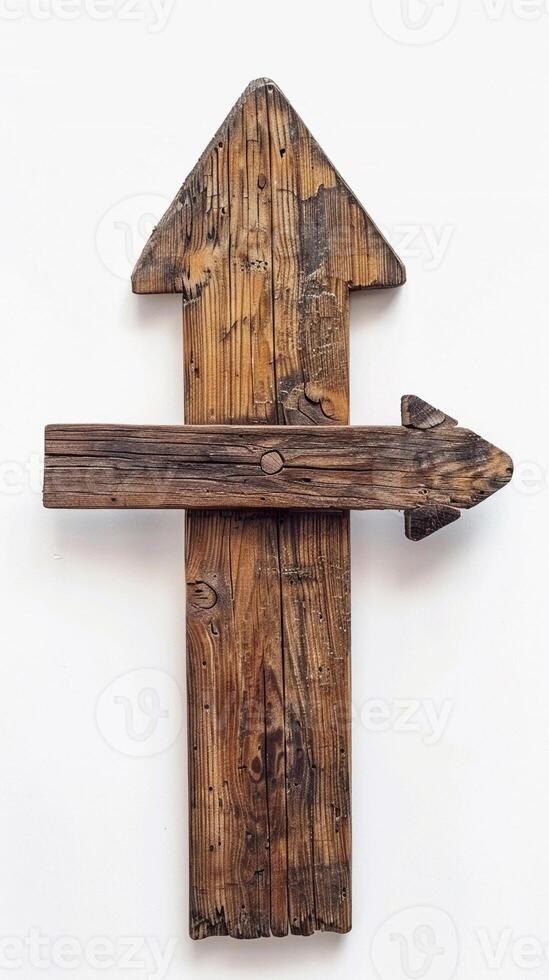 Wooden arrow sign, isolated on white background photo