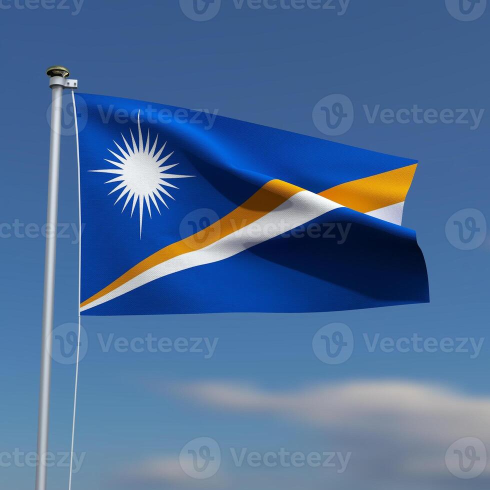 Marshall Islands Flag is waving in front of a blue sky with blurred clouds in the background photo