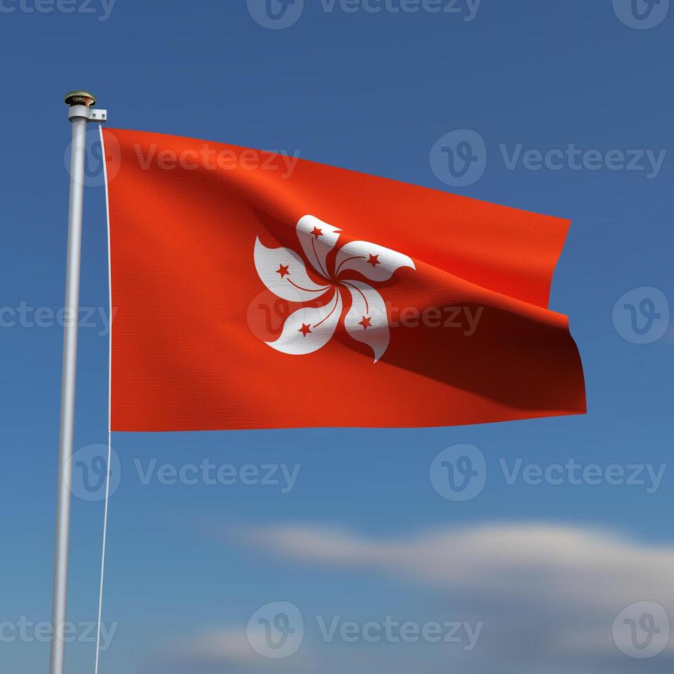 Hong Kong Flag is waving in front of a blue sky with blurred clouds in the background photo