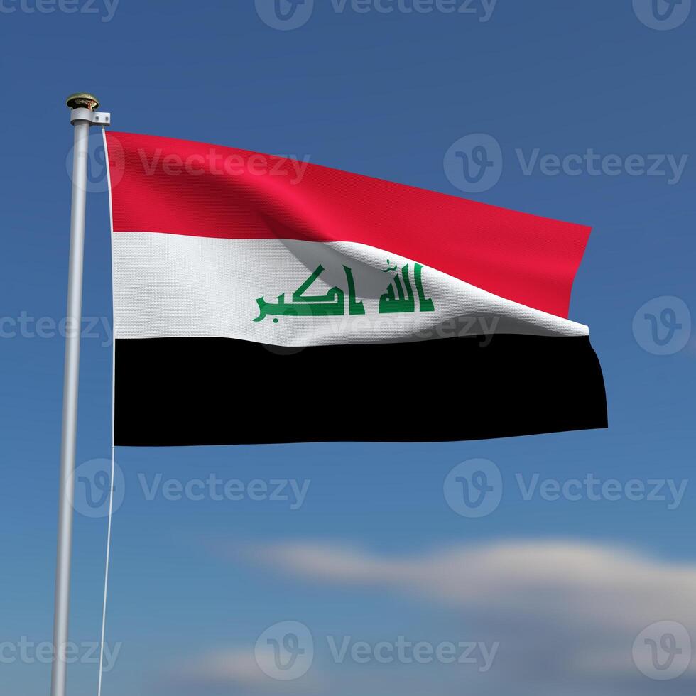 Iraq Flag is waving in front of a blue sky with blurred clouds in the background photo
