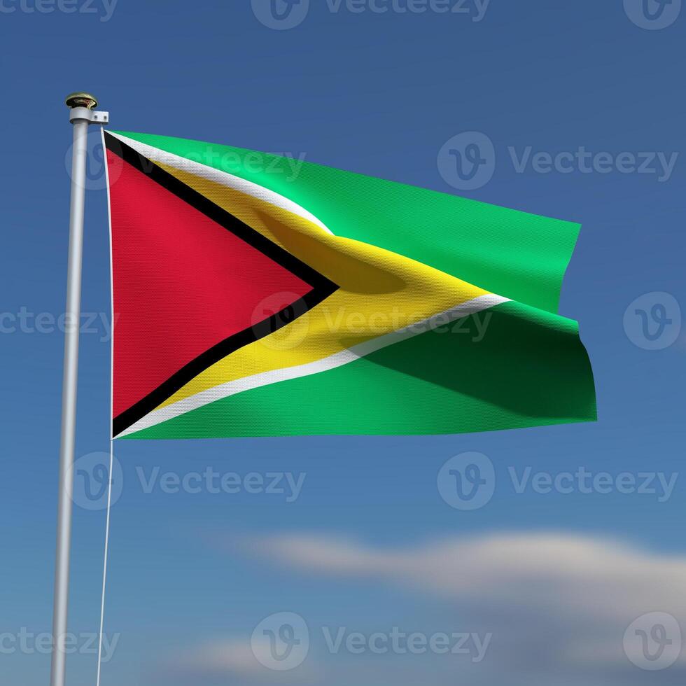 Guyana Flag is waving in front of a blue sky with blurred clouds in the background photo