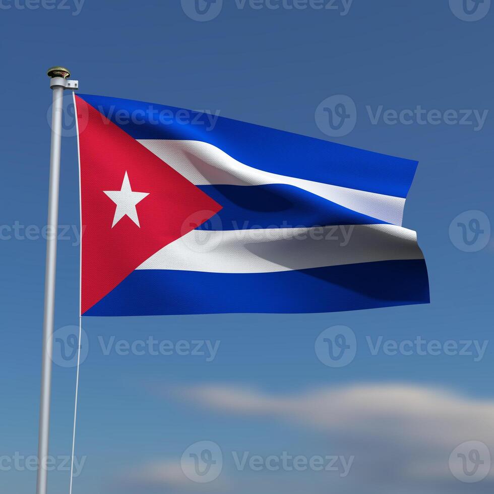 Cuba Flag is waving in front of a blue sky with blurred clouds in the background photo