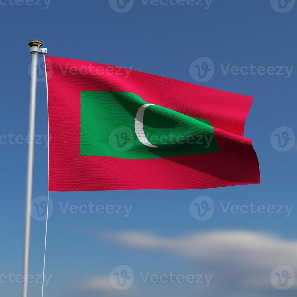 Maldives Flag is waving in front of a blue sky with blurred clouds in the background photo