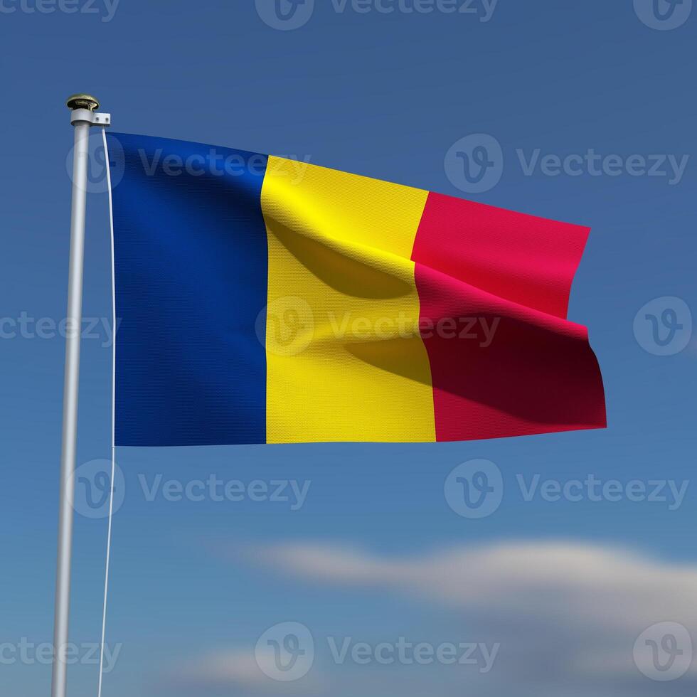 Chad Flag is waving in front of a blue sky with blurred clouds in the background photo