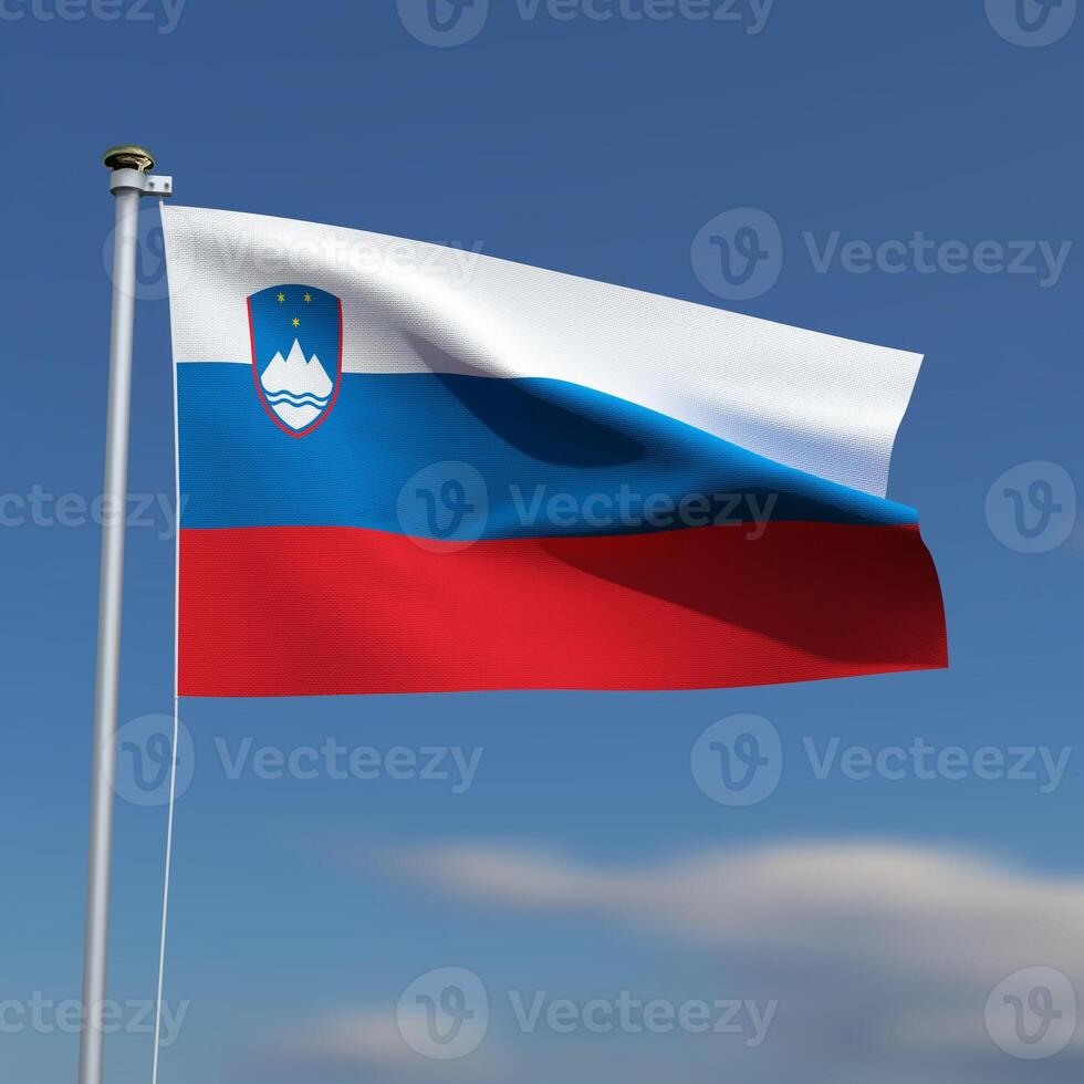 Slovenia Flag is waving in front of a blue sky with blurred clouds in the background photo