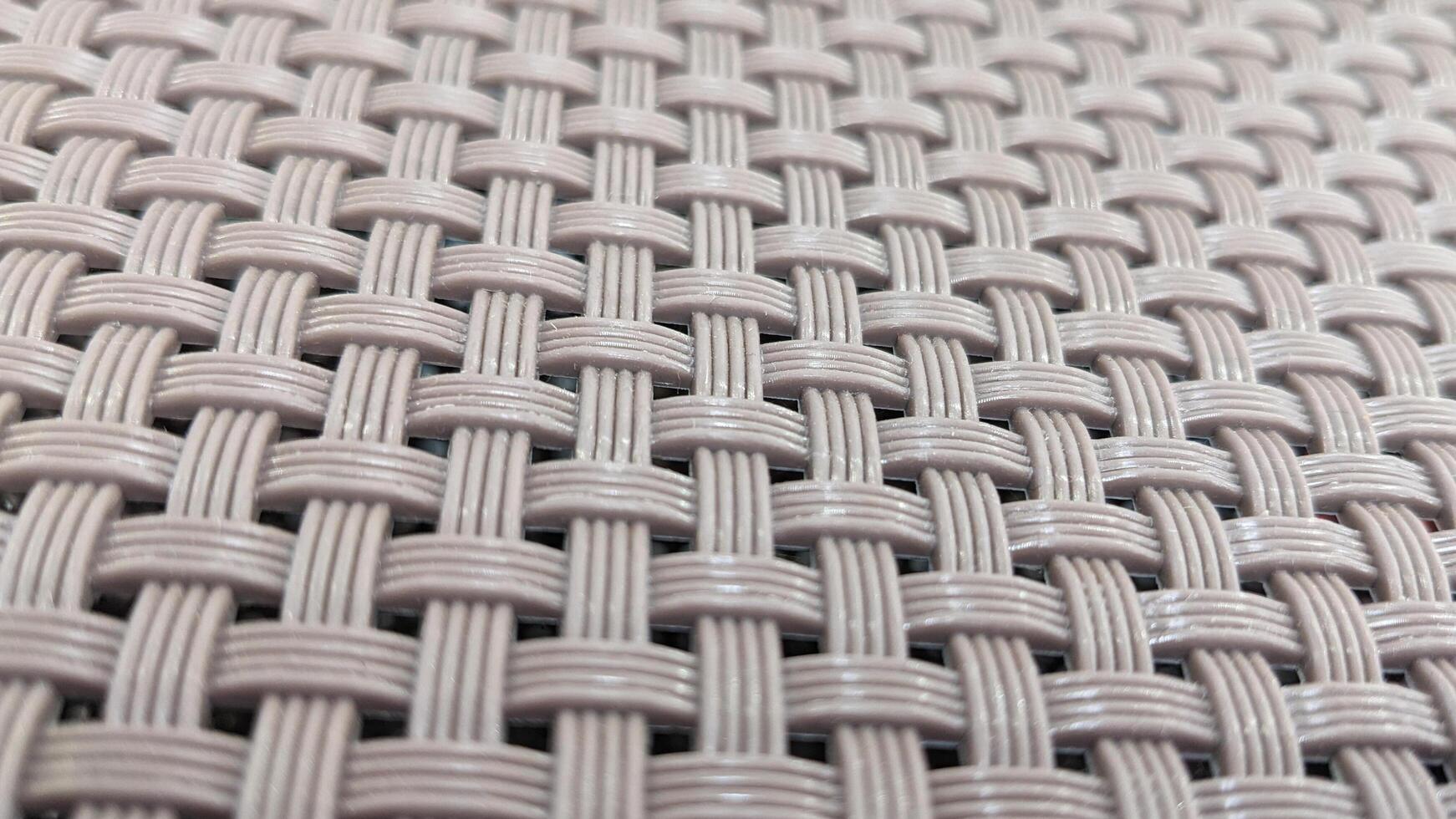 A woven pattern of white and black photo