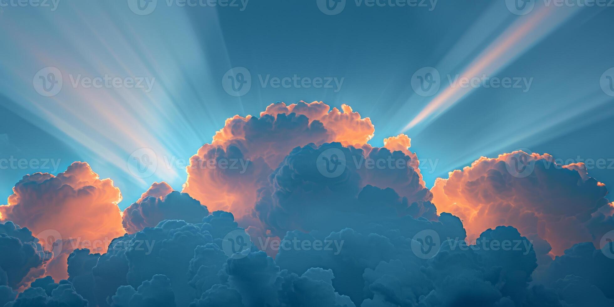 The sky is filled with clouds and the sun is shining through them photo