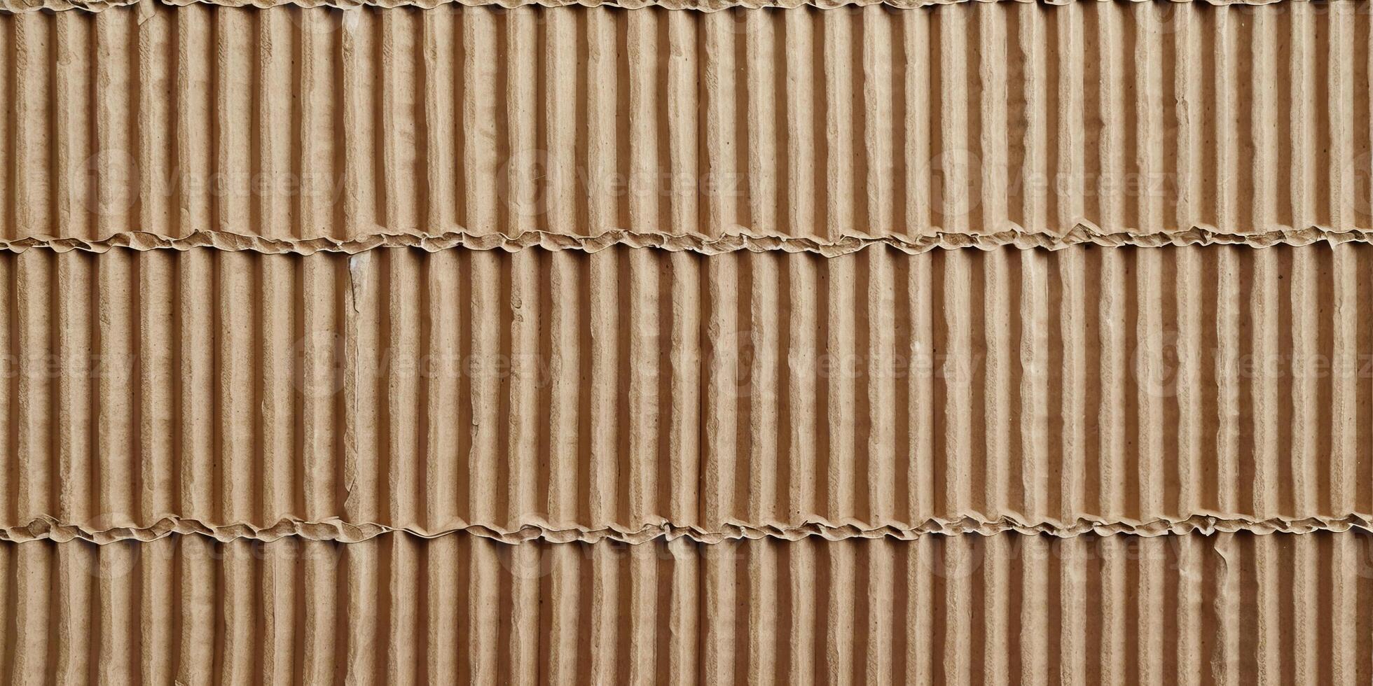 A brown cardboard strip with a pattern of lines photo