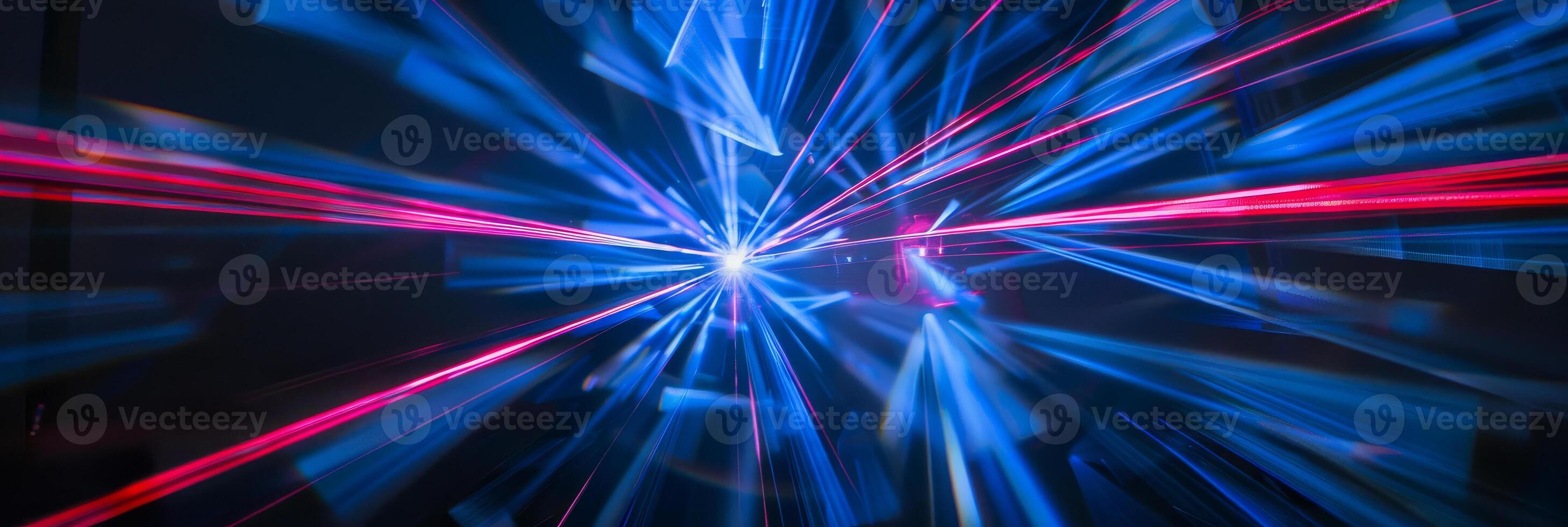 A bright blue and red light show with a lot of movement photo