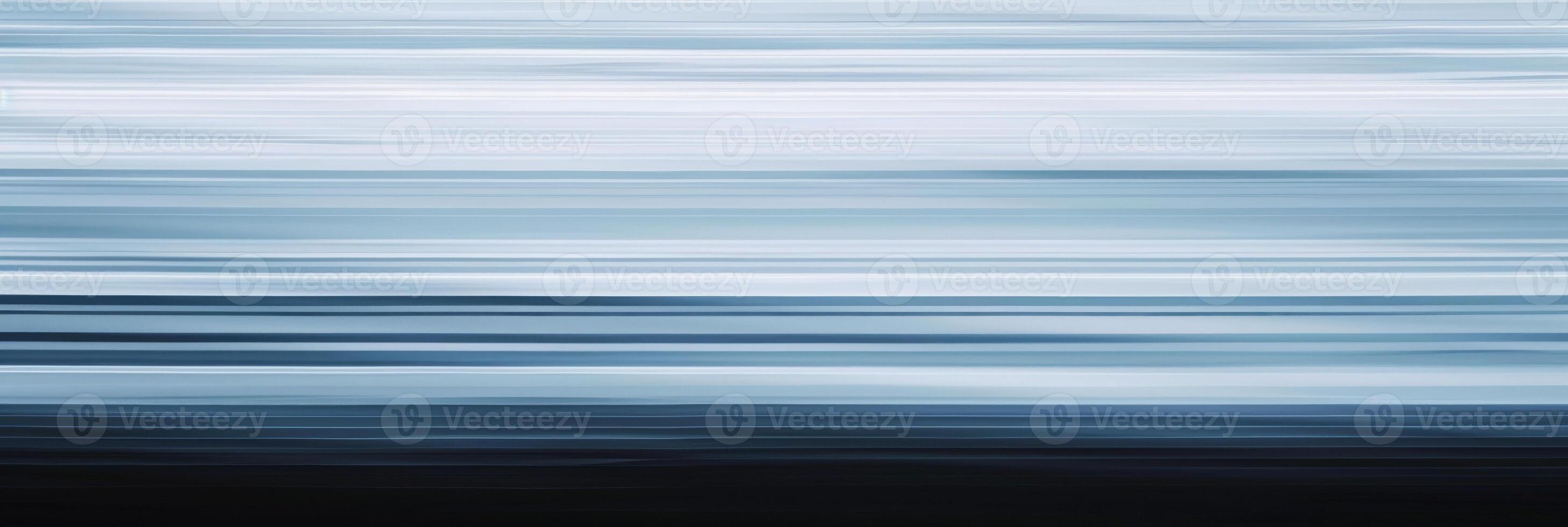 A blurry of a blue ocean with white clouds photo