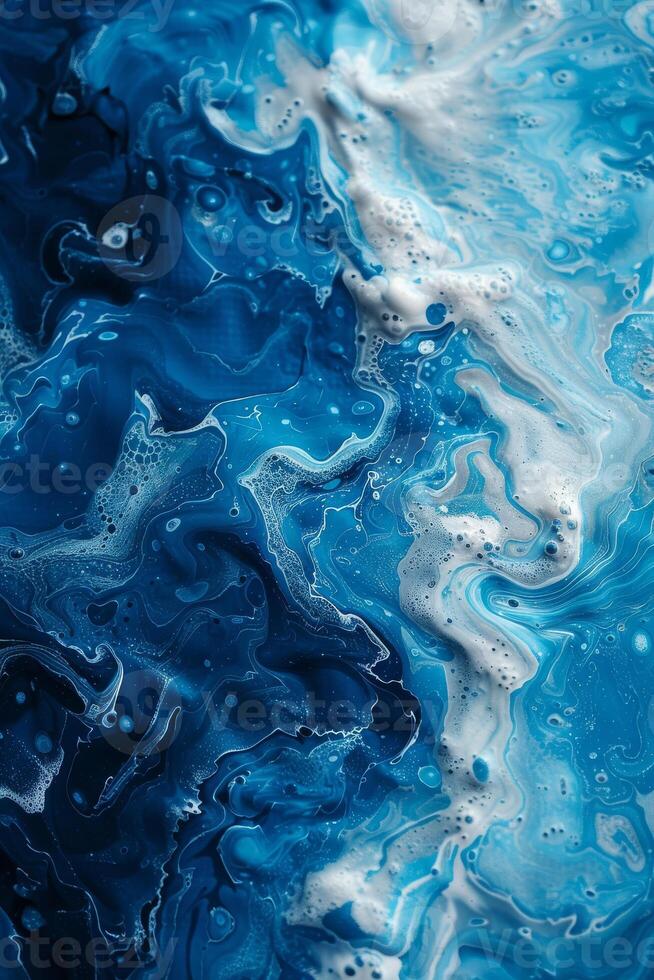 A wave with blue and white colors photo